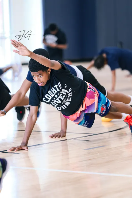 A player holding a plank during training