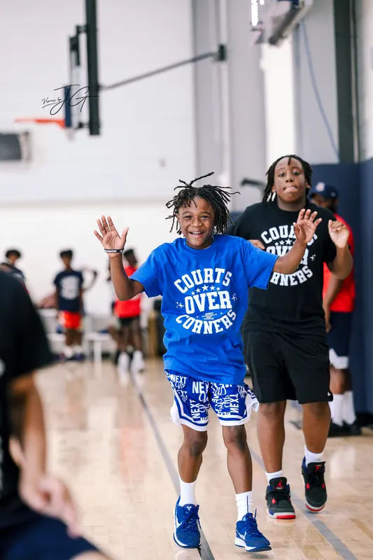 A smiling young player warming up